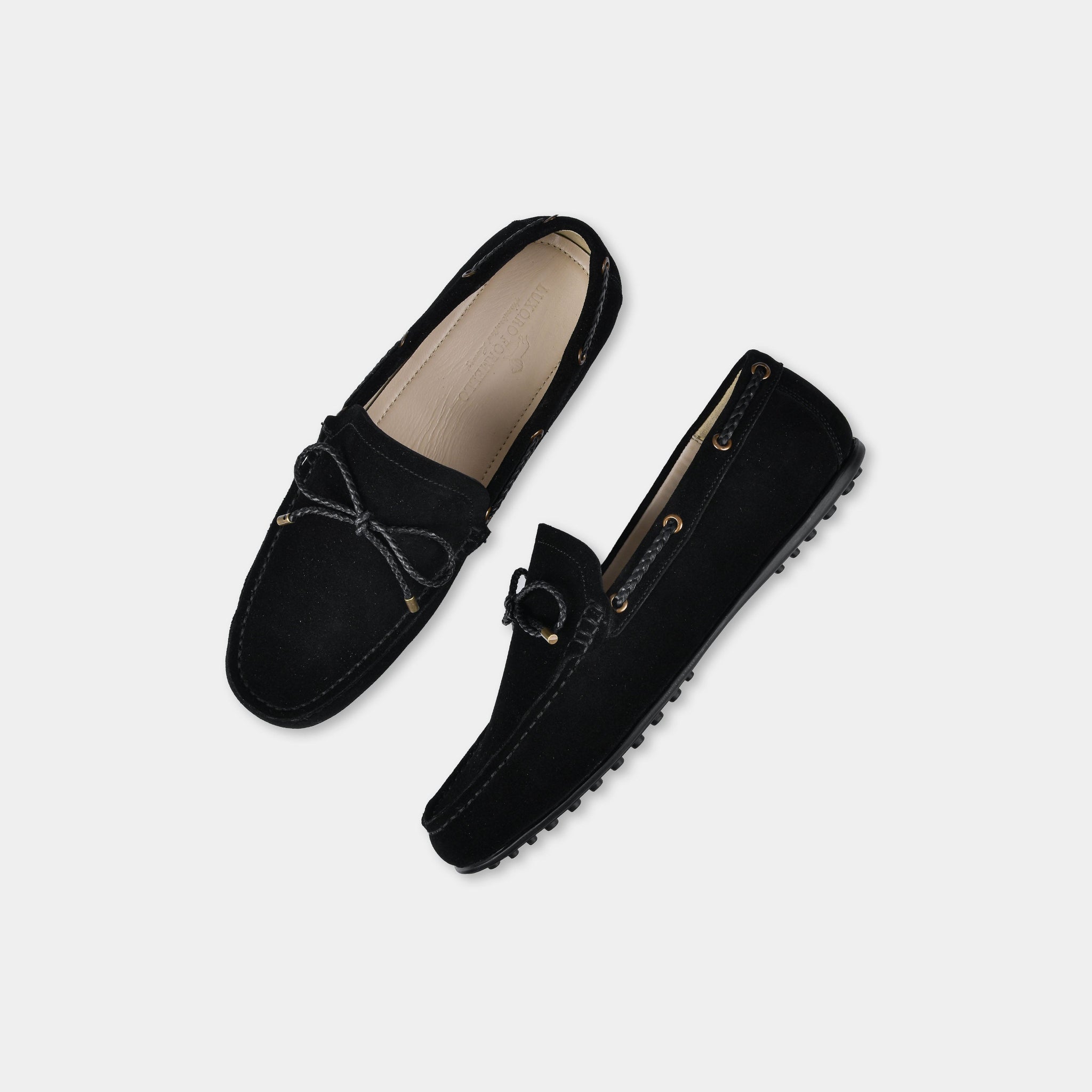 Pair of Julian Black Suede Leather Driving Loafers with bow detail, shown from top view.