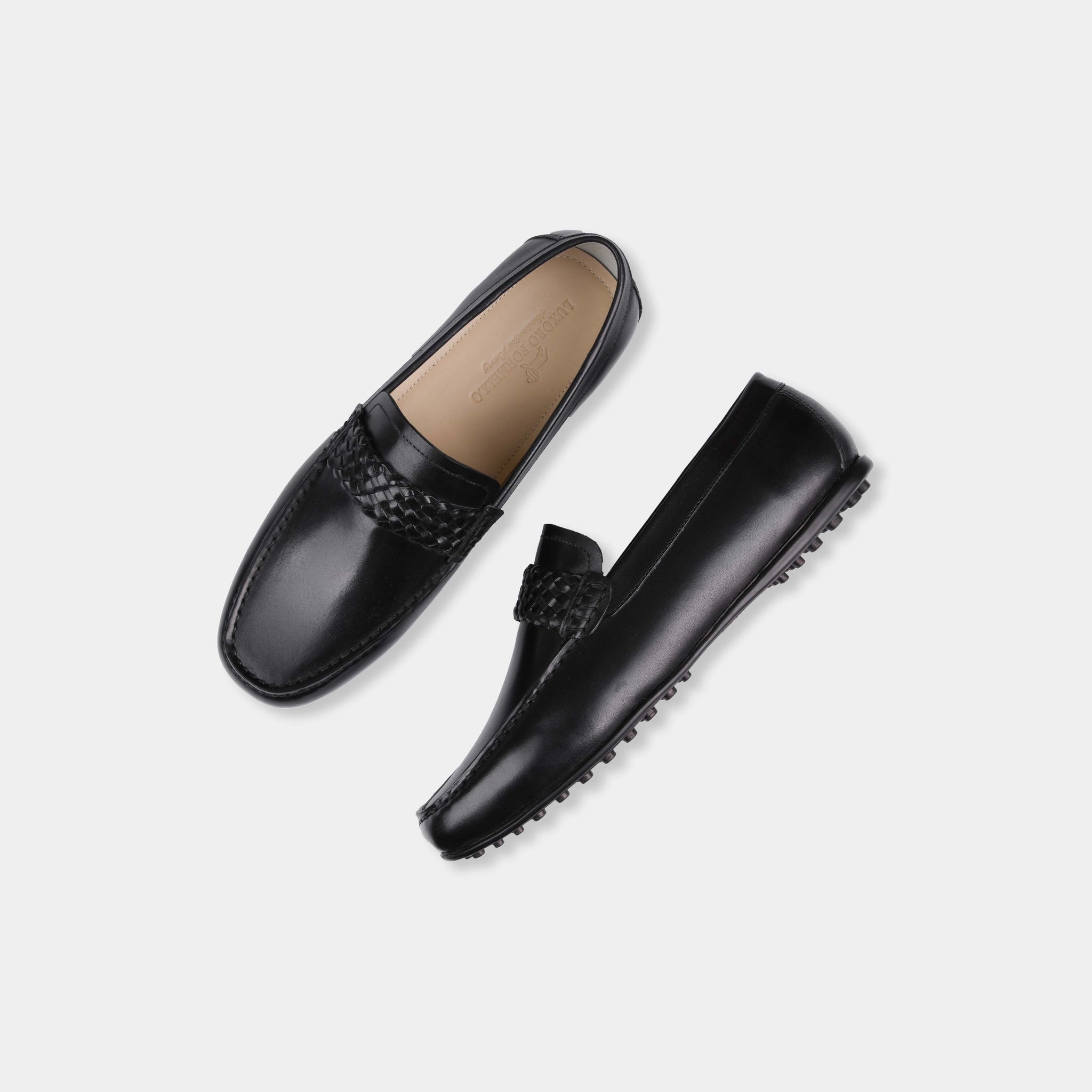 Pair of Denver Black Leather Driving Loafers with woven strap detail, shown from above.