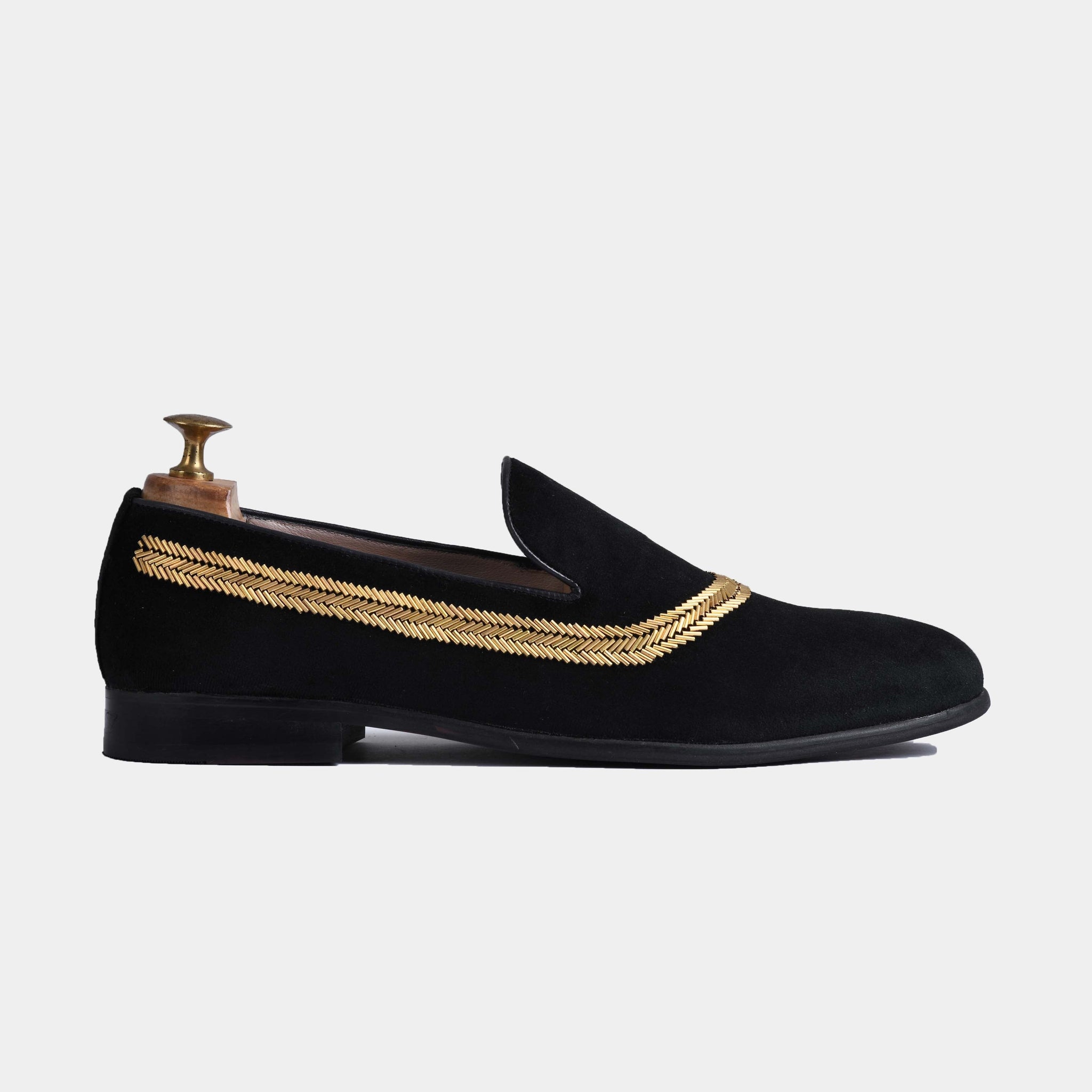 Black suede slip-on shoes with gold embroidered trim. Alvaro Black Embroidered Leather Slip-Ons.