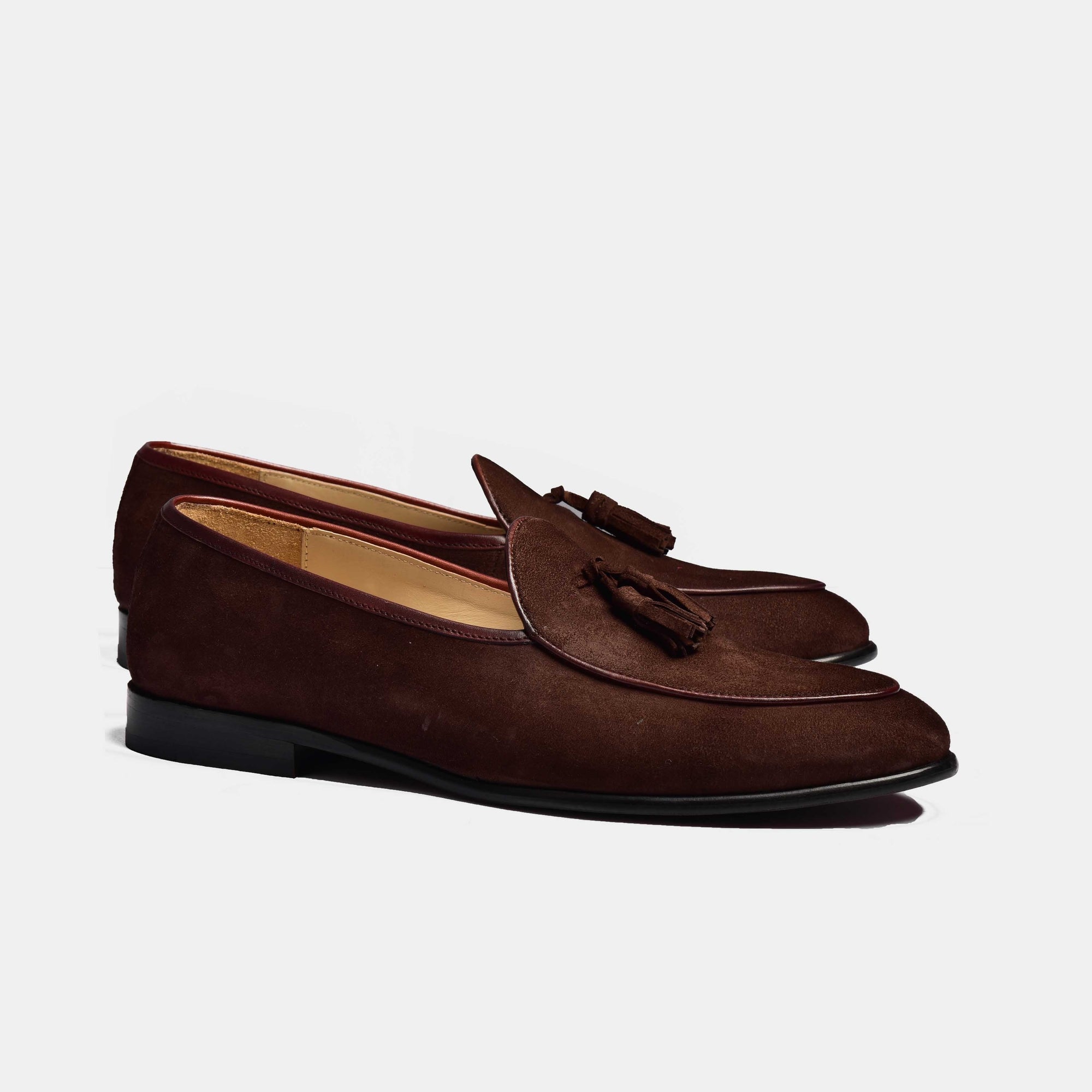 Pair of brown suede Arno Loafers with classic tassels.