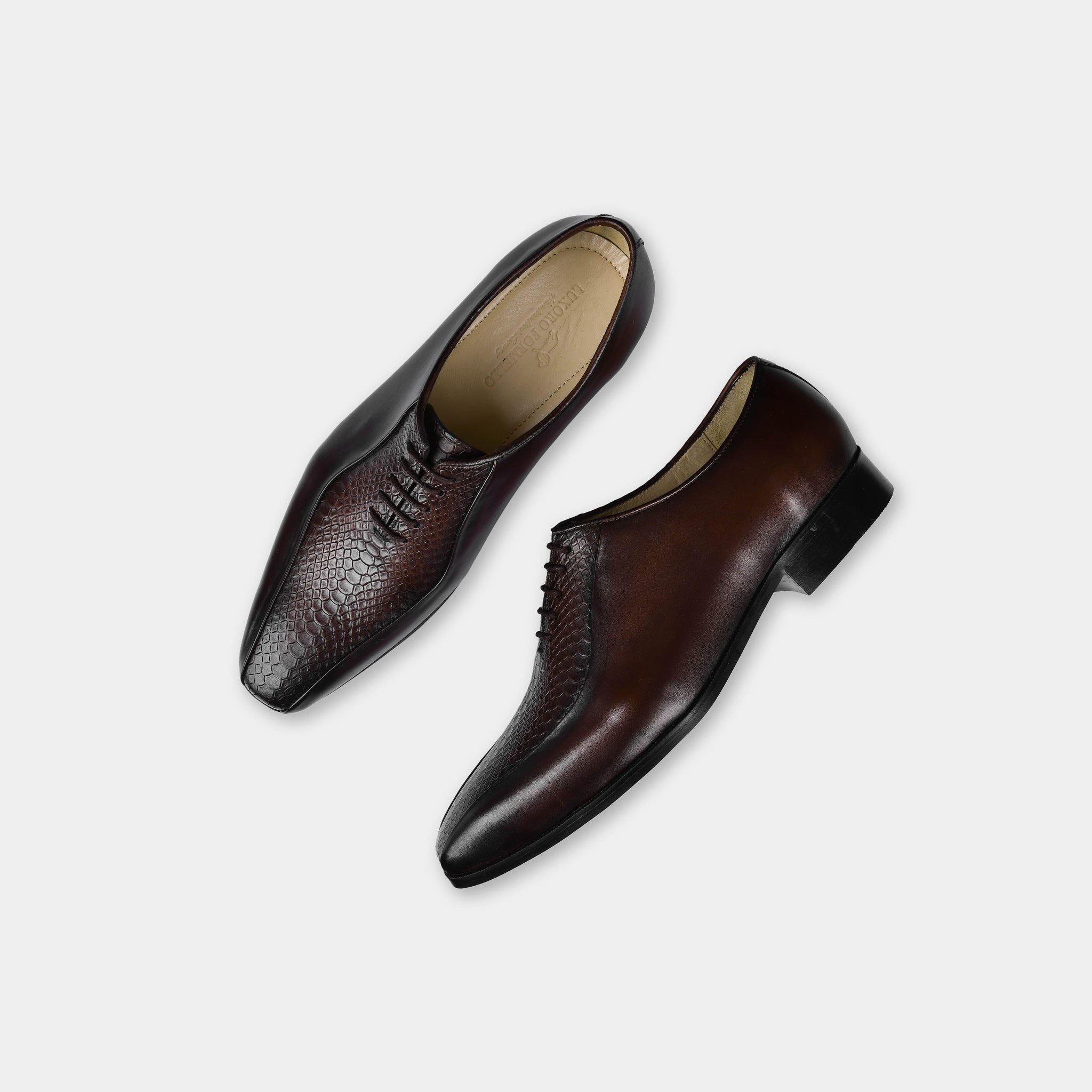 Pair of Armando Brown Leather Laceups, brown dress shoes with a textured toe and laces.