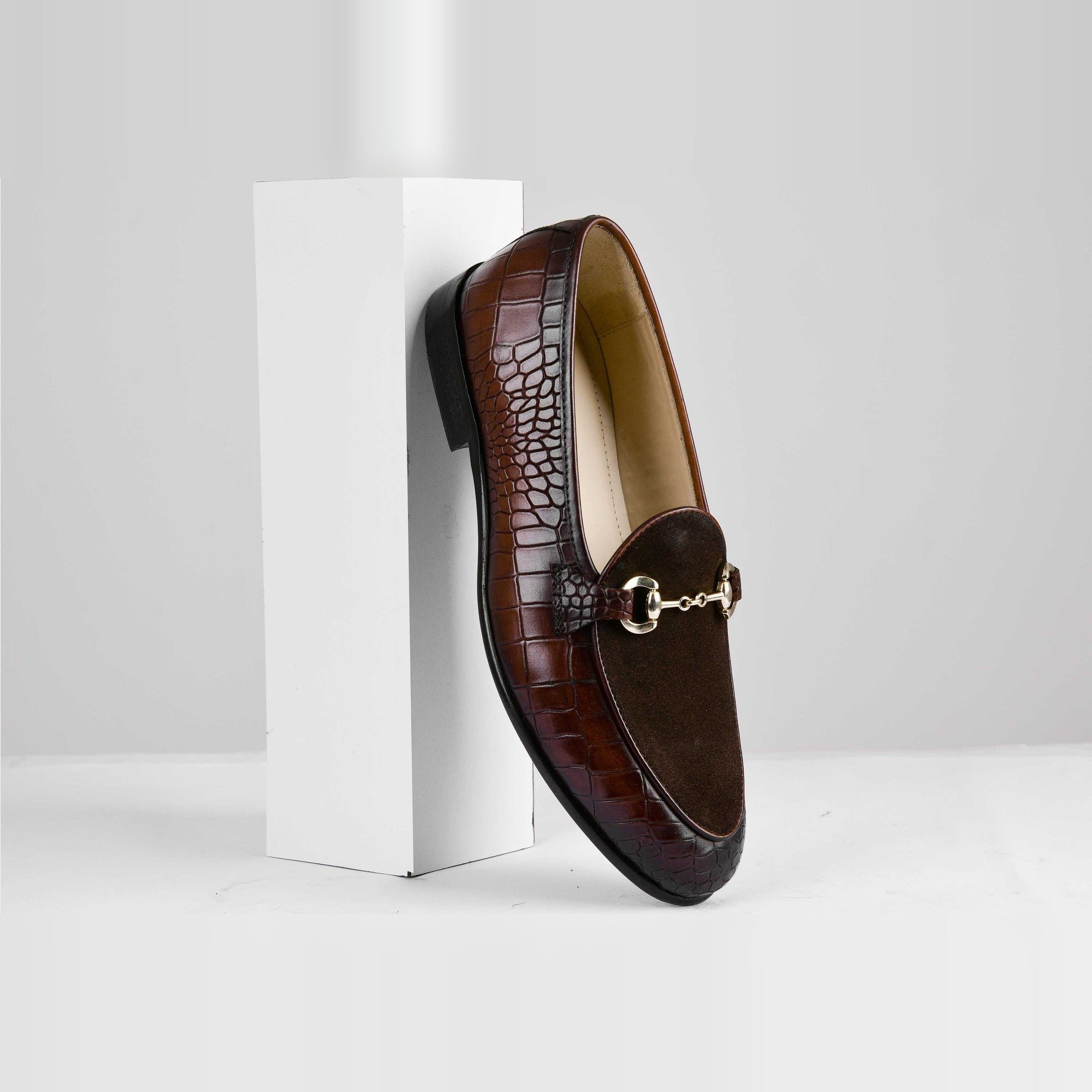 Azura Brown Leather Loafers with a crocodile-embossed pattern and a gold buckle detail.