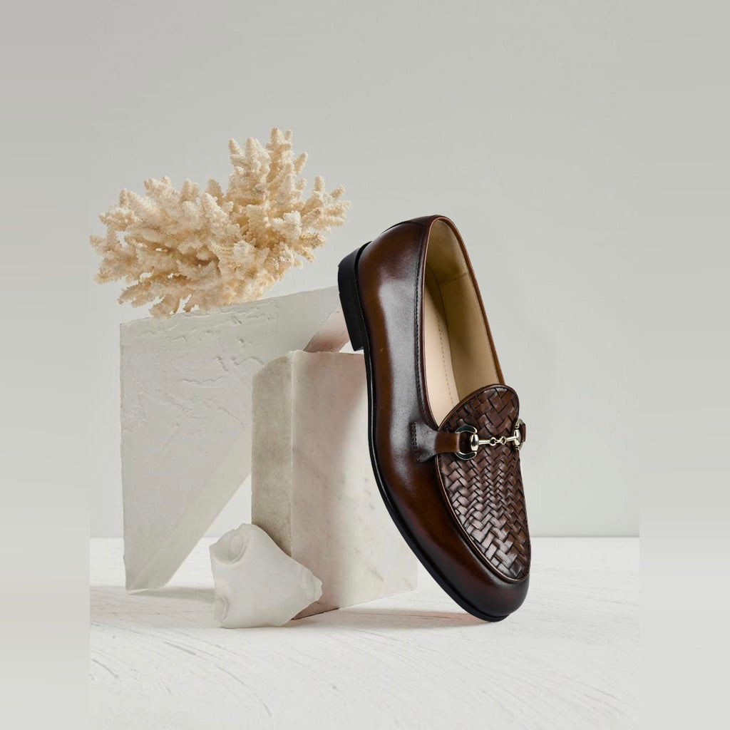 Stylish brown leather loafers with a woven design and metal buckle detail. Santiago Weaved Brown Leather Loafers.